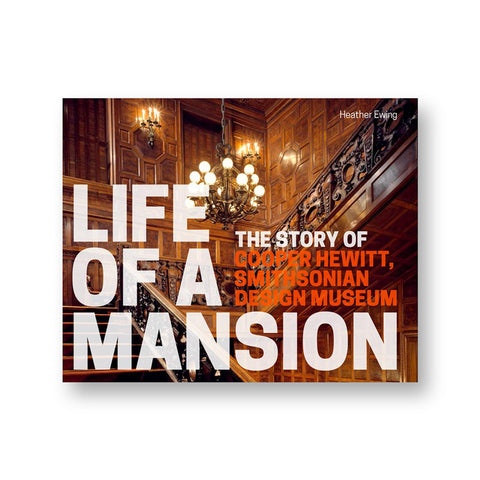Horizontal book cover with photograph of a warmly colored wood clad interior covered with bold san serif title information